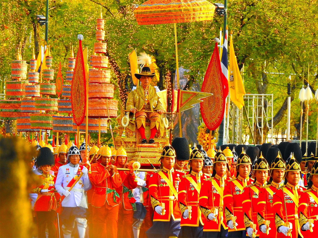 Thailand says photo of Macron kneeling before King Vajiralongkorn is AI-generate